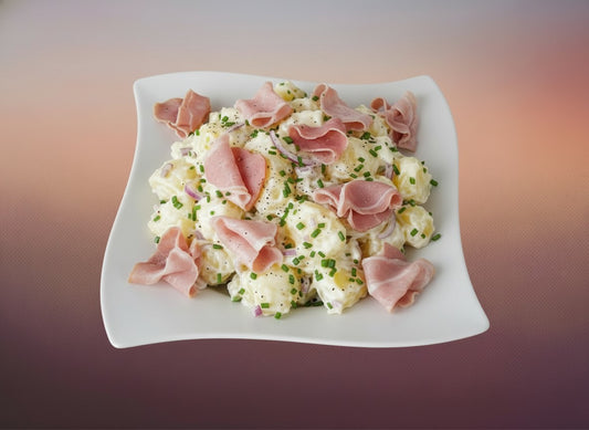Homemade potato salad with ham
